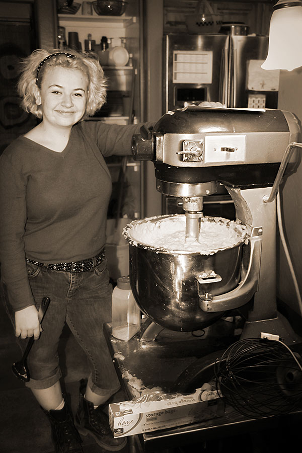 The enormous vat of garlic-cream-cheese-mashed-potatoes,  a work in progress, with Geneva overseeing the Hobart.