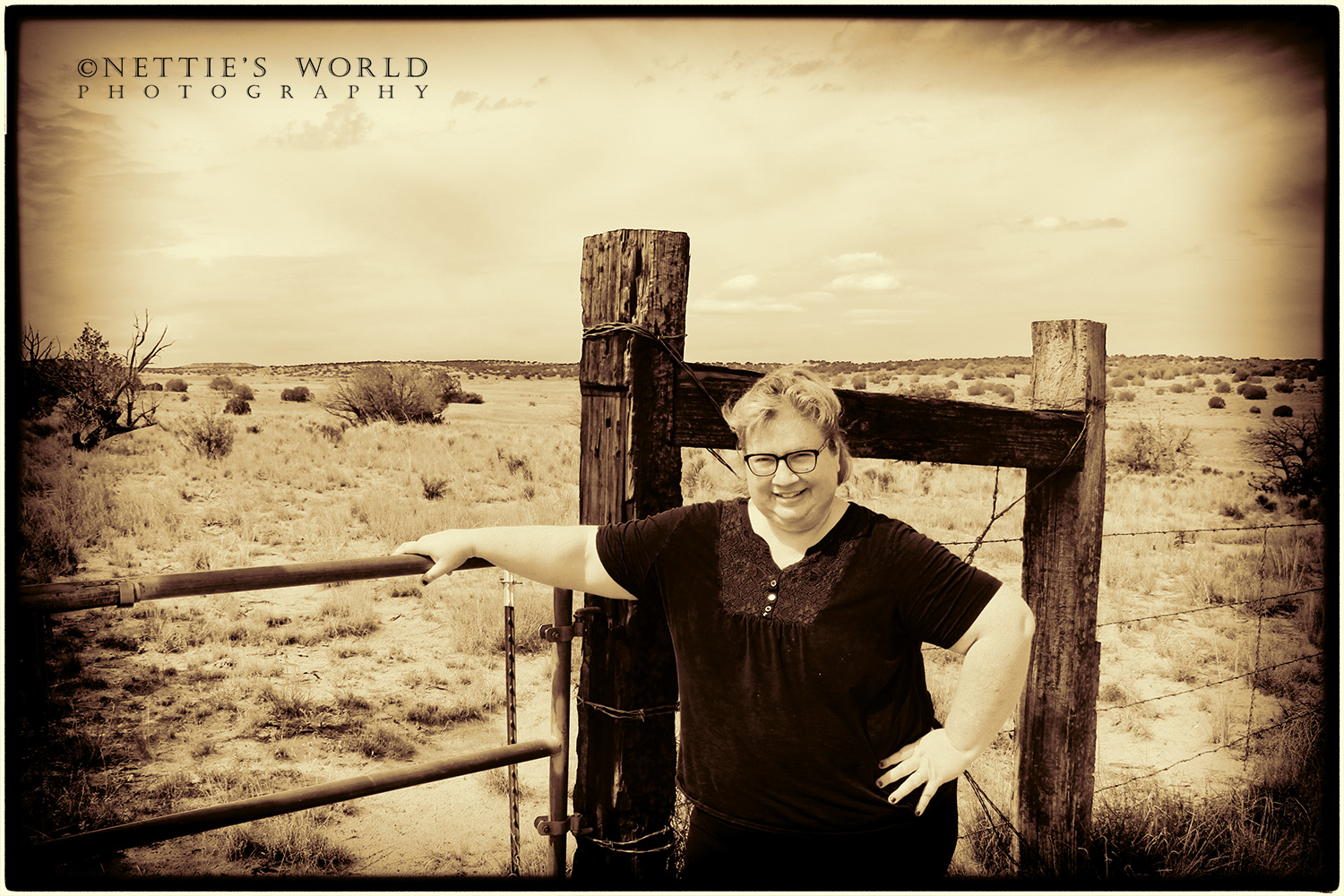 Me, by the south side gate (I rarely get over to that side of the property, so it was worth a photo. :)