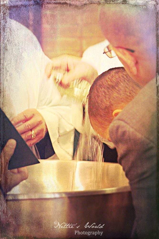 Baptized in the name of the Father, Son and Holy Spirit!