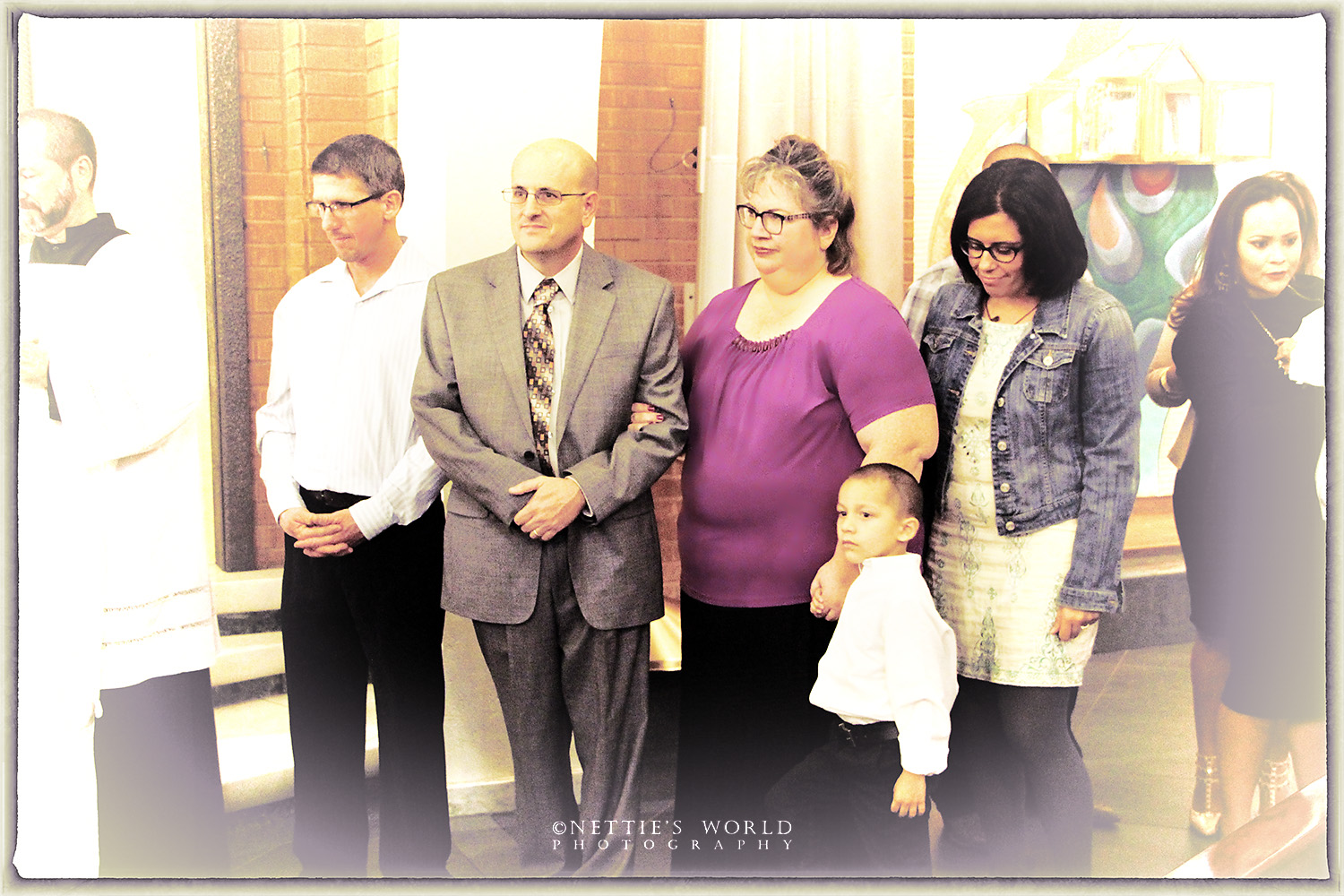 With the Godparents at the font.