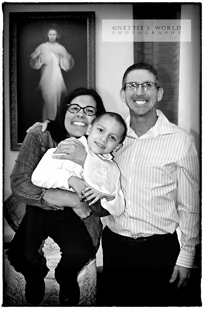 Sweet pic of Efrain with his Godparents.