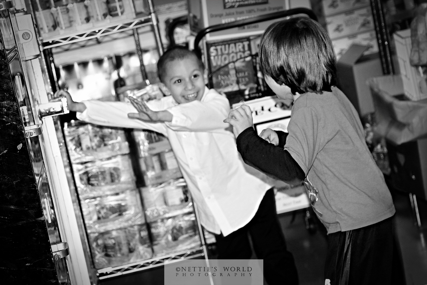 Efrain and his BFF/cousin Lakota had the best time running around together. Here they are about to break into the refrigerator room.