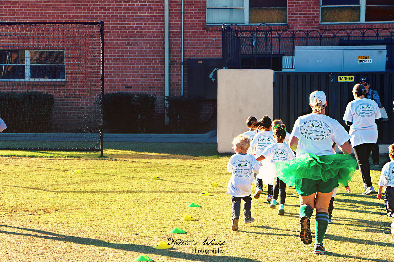 Everyone loves Coach Keebler's fluffy green race day tutu!