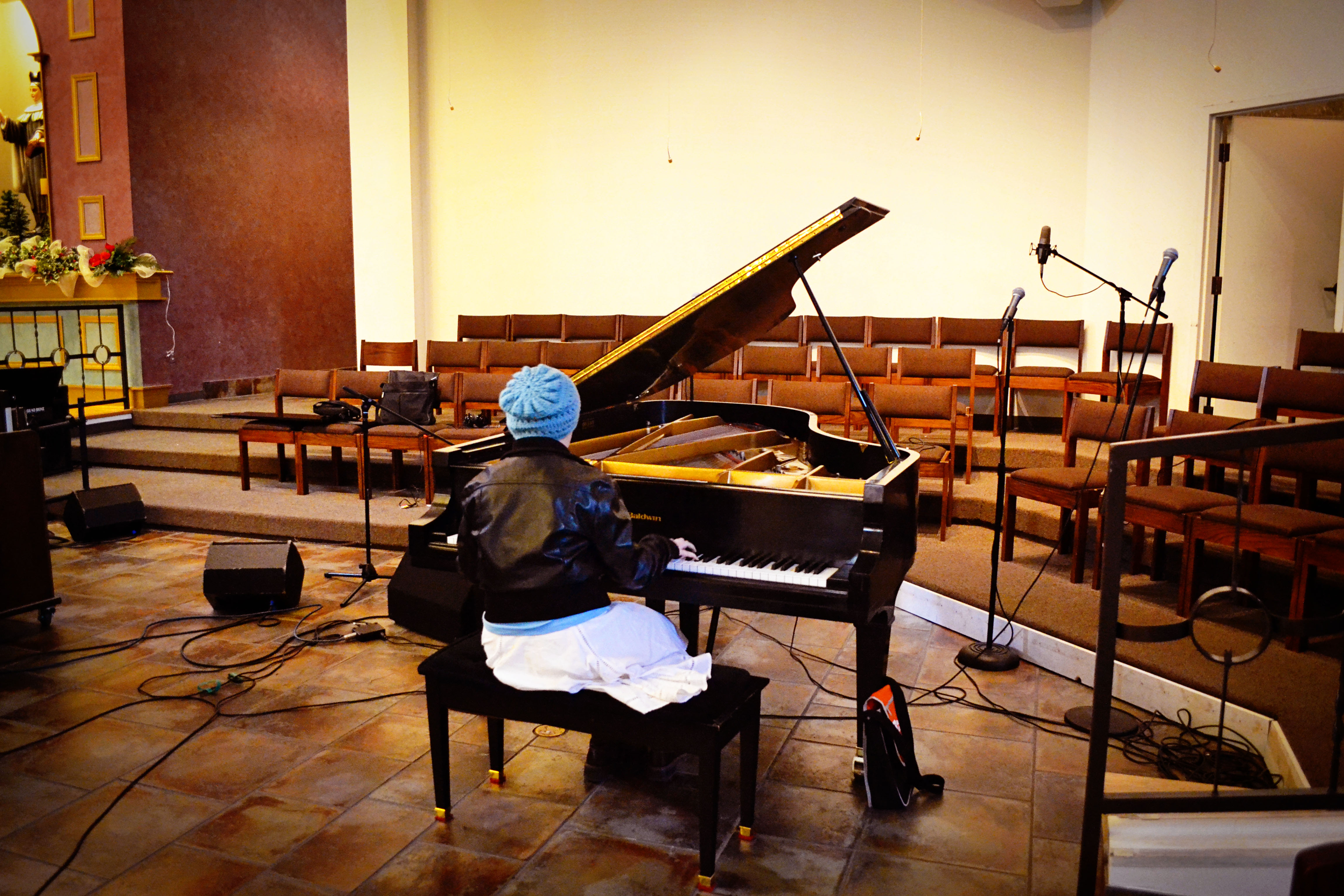 Little Geneva at the very big piano.