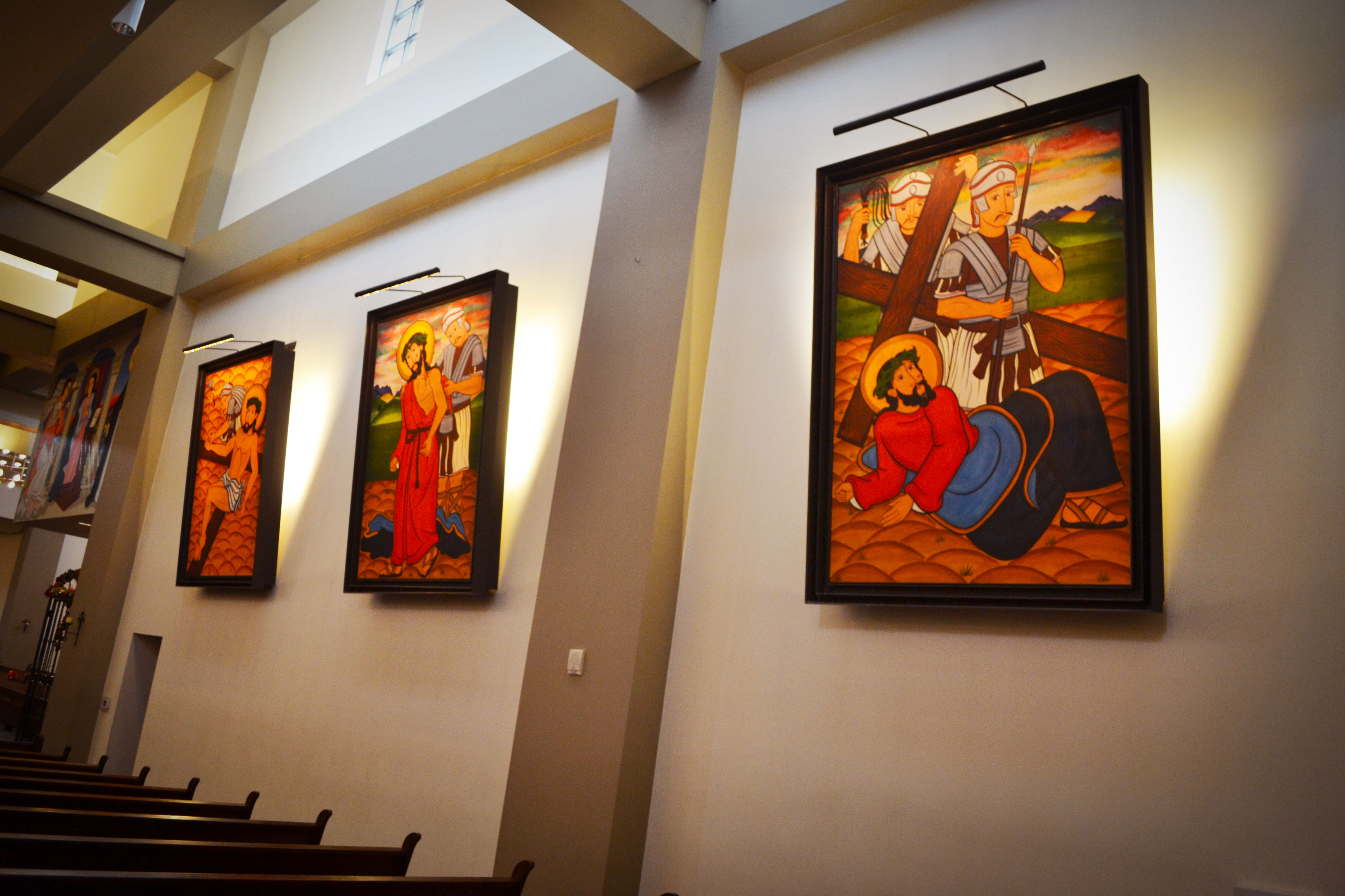 These paintings surround the church, and you can see them in many of the photos.  They are stations of the cross.
