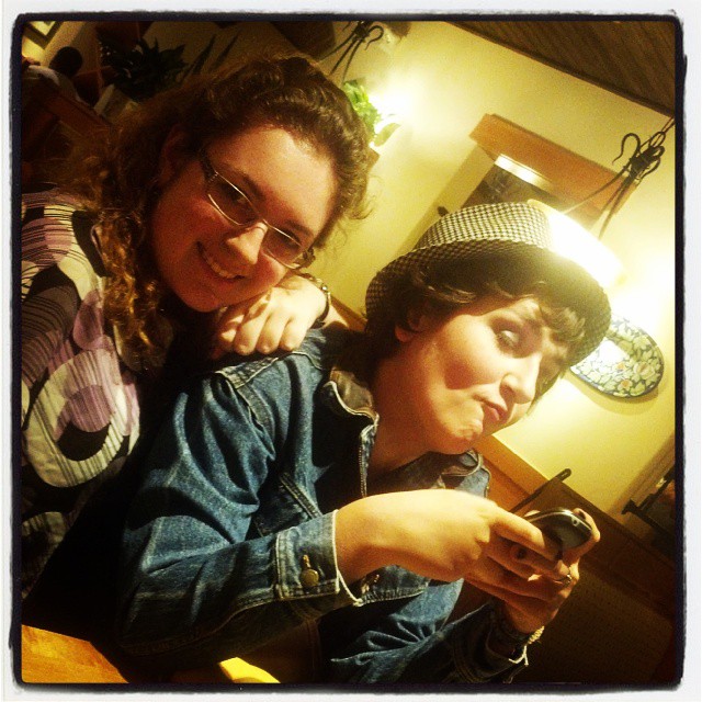 Sisters in a typical pose.