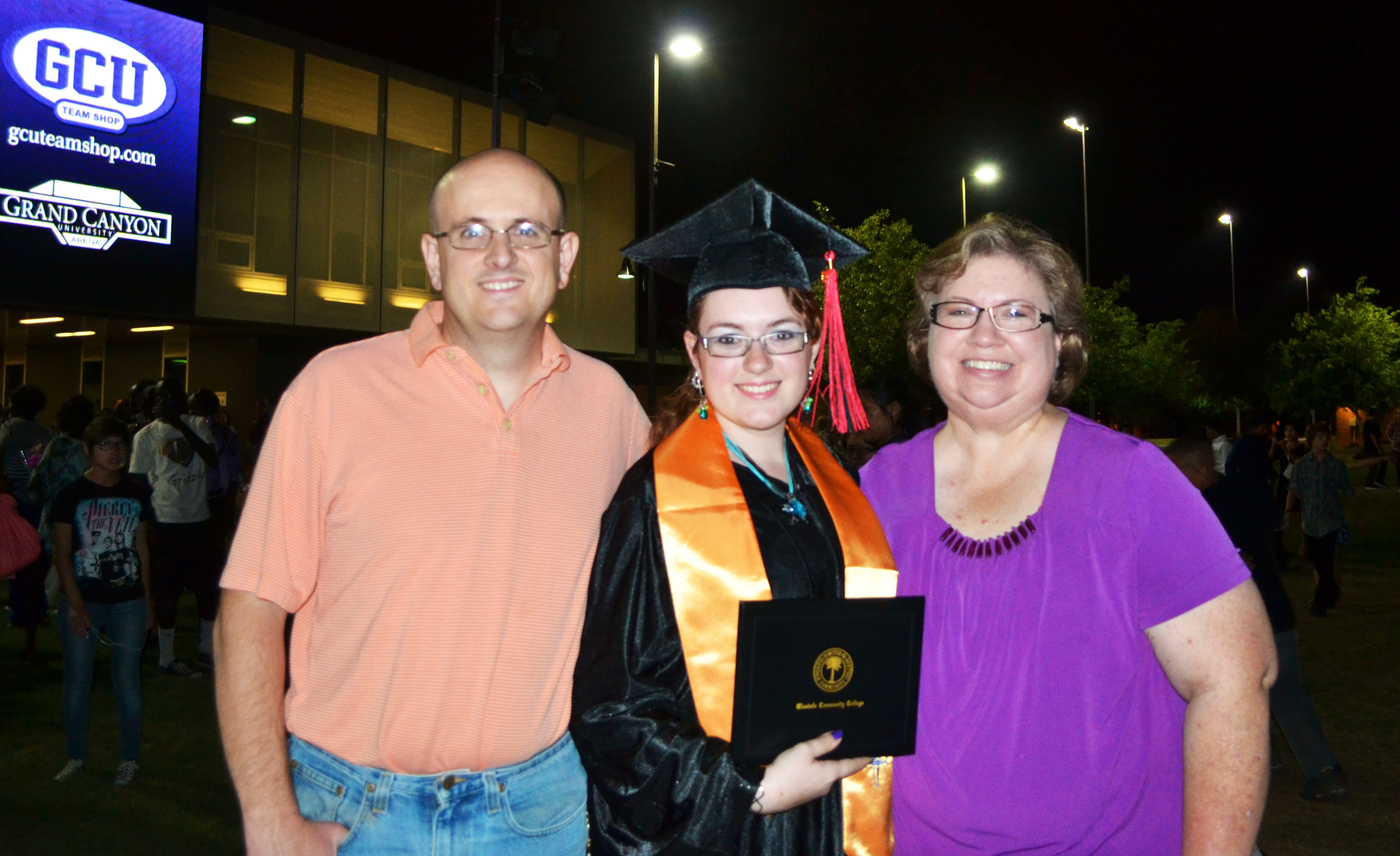 Mom, Dad, and Grad.