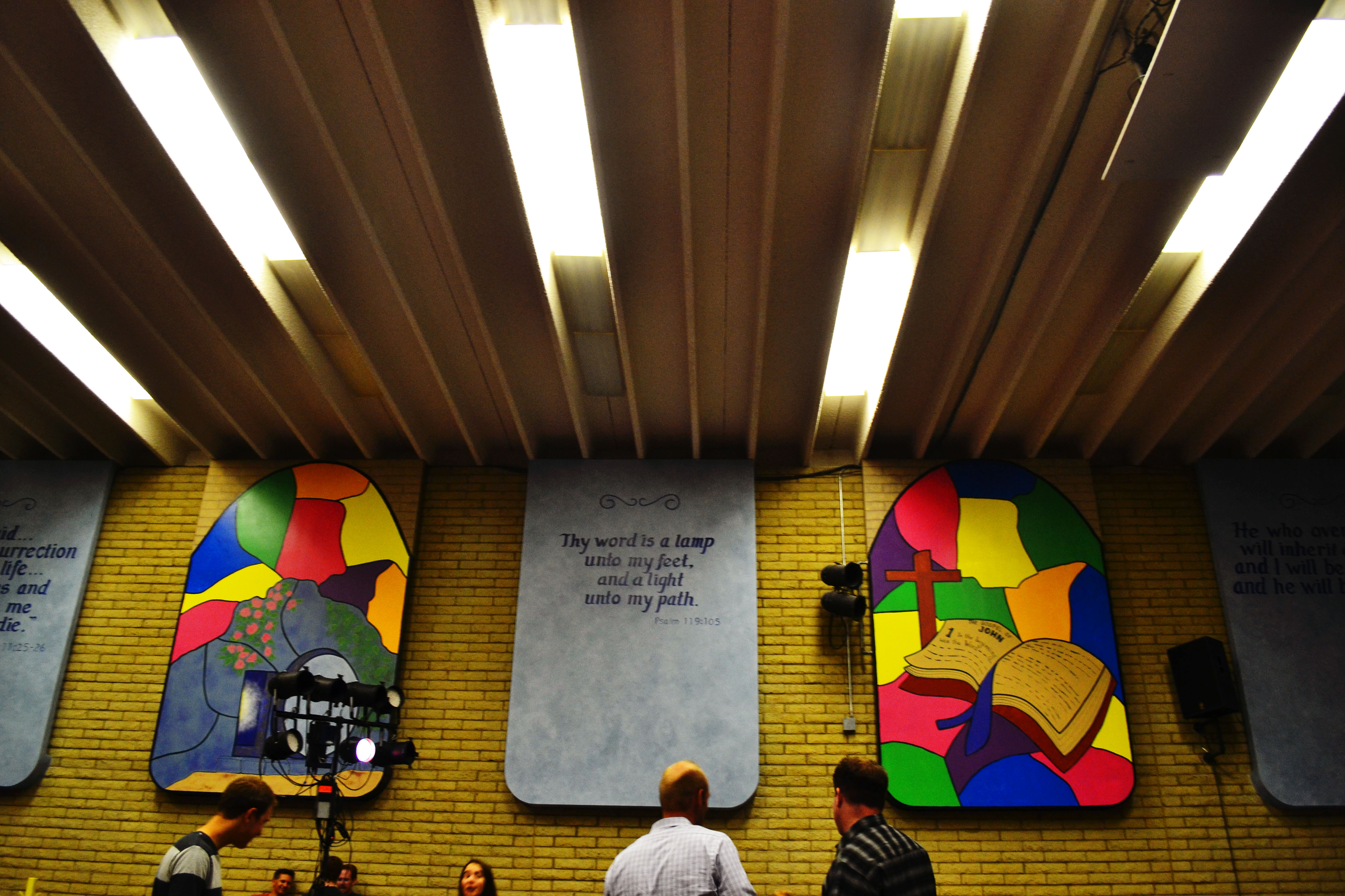 Painted stained-glass style murals in the church